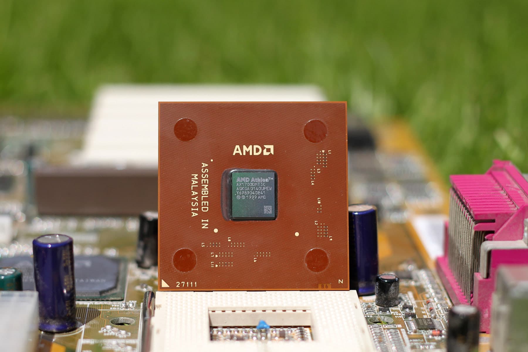 An AMD Athlon XP Palomino processor mounted on a motherboard