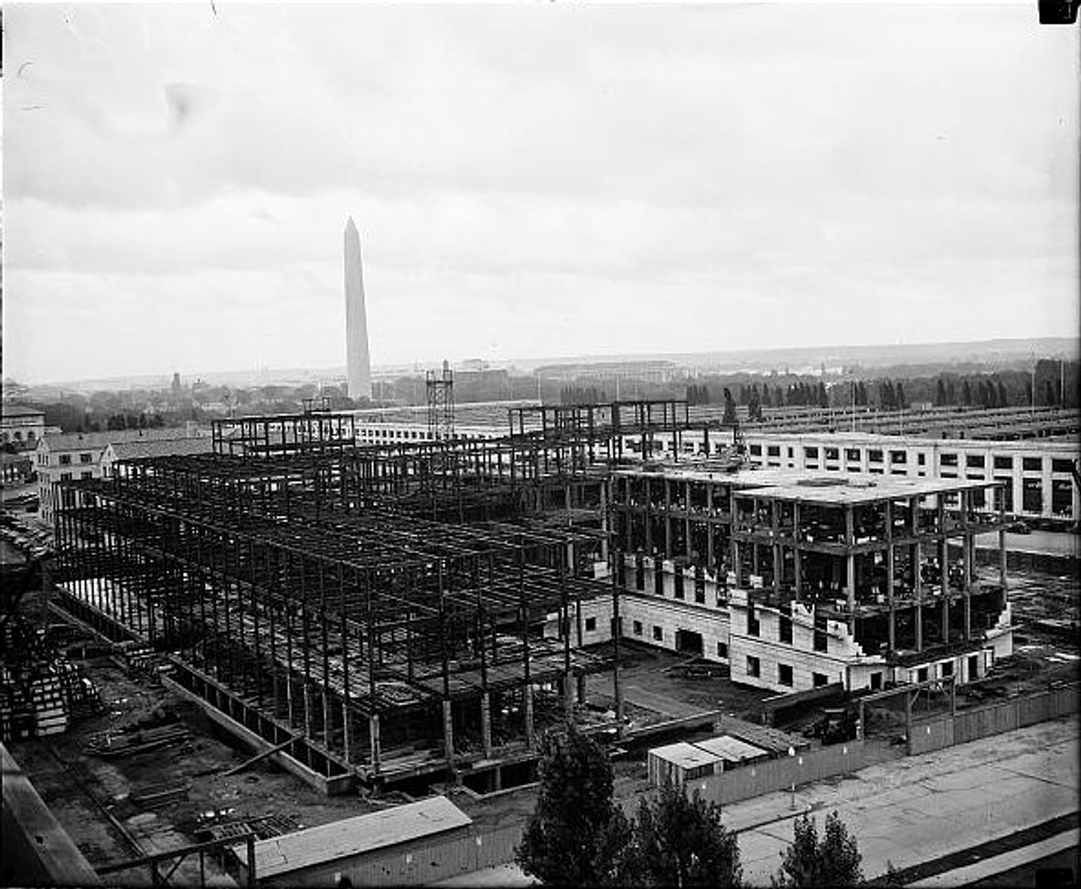The Eccles Building under construction in Washington in 1936, with the Washington Monument obelisk in the background